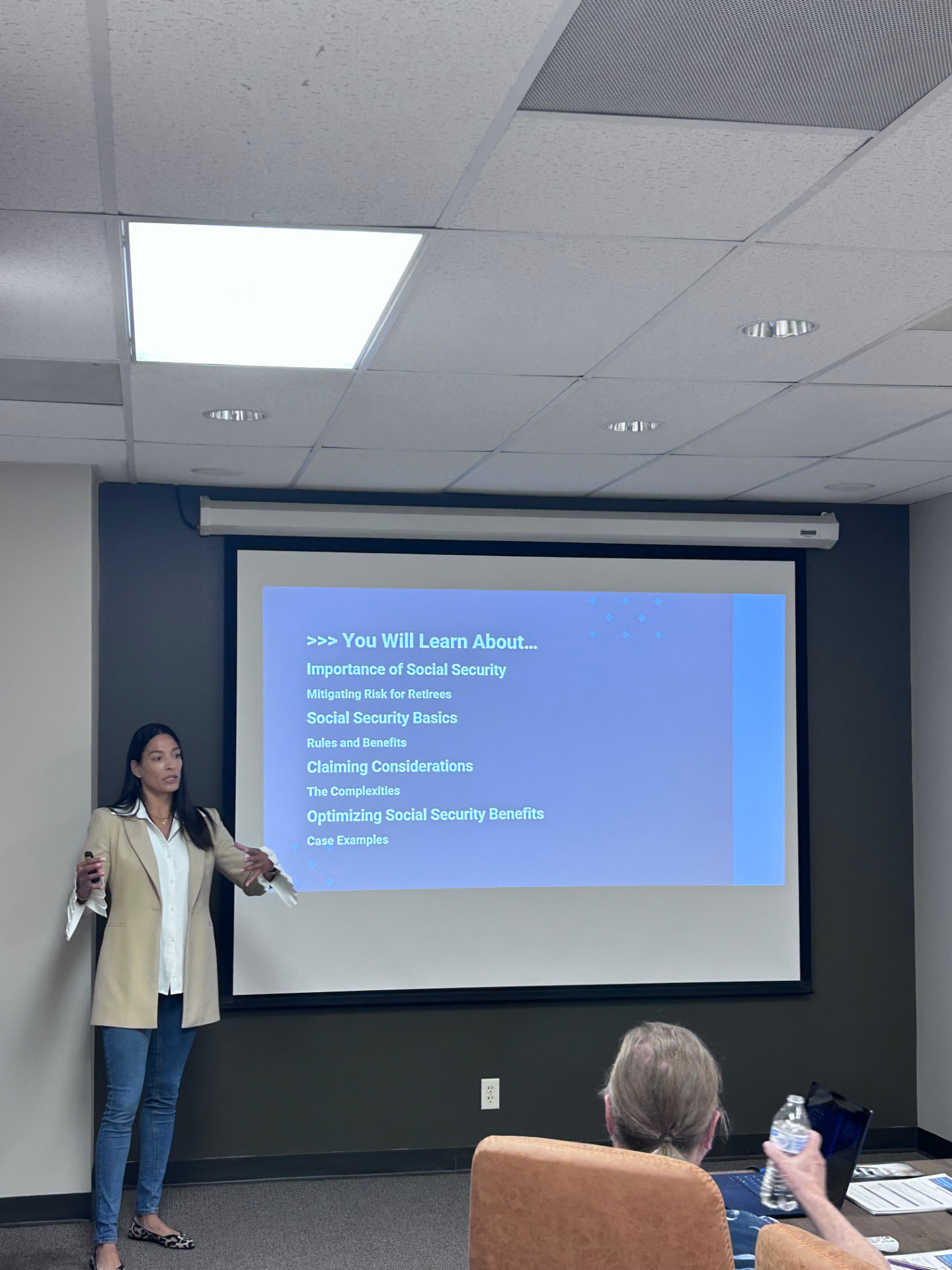 Natalie Contorno presenting at the Retiring Well seminar on Social Security and retirement income strategy